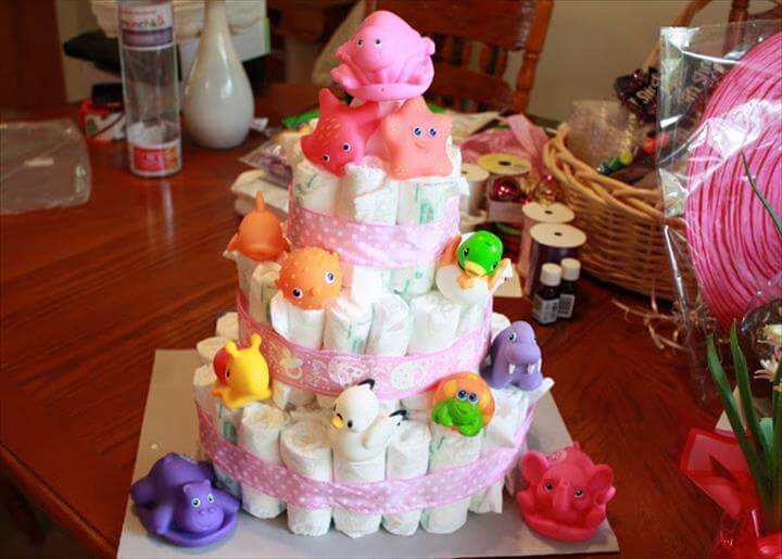 baby shower diaper cake with a hidden gift inside