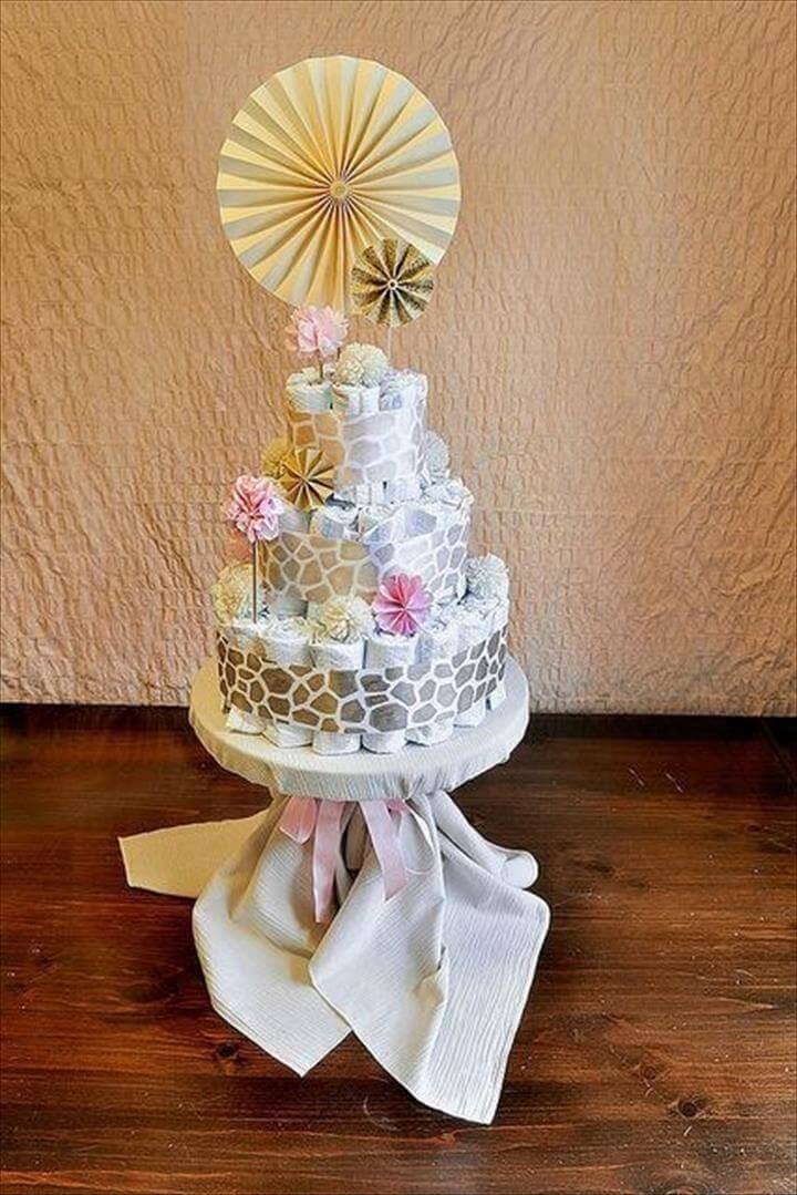 giraffe printed ribbon wrapped diaper cake