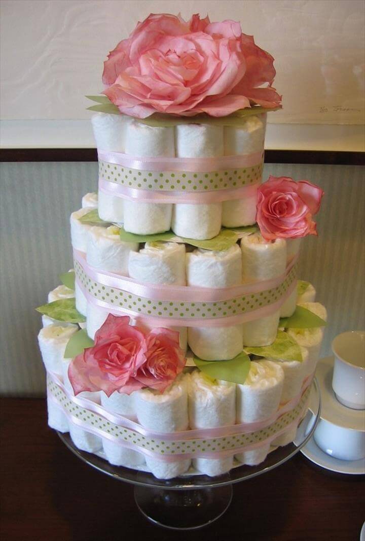 3 tiered diaper cake topped with silk roses