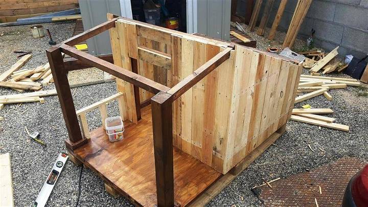 covering the dog house frame using extra wood