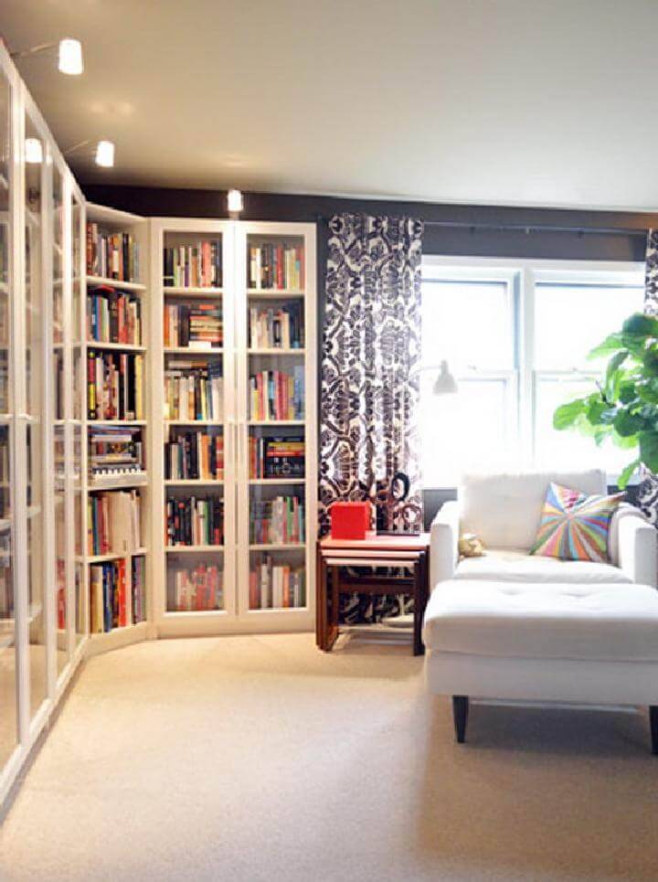 DIY Modern BILLY Bookcases with Height Extensions and Glass Doors