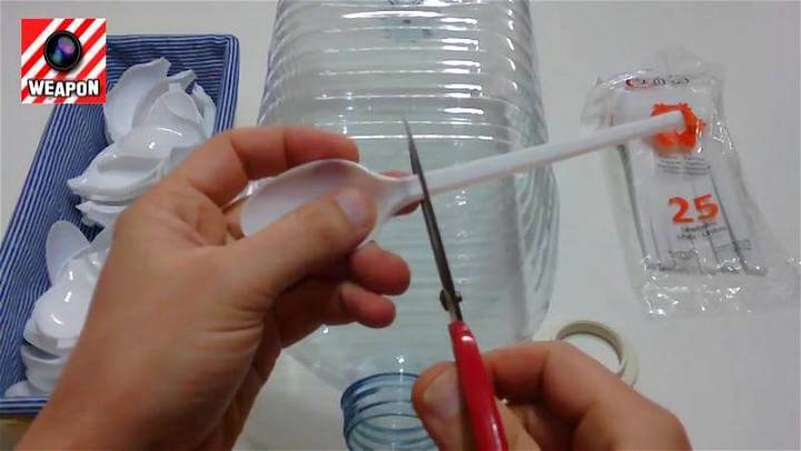 Cut the Heads of the Plastic Spoons with Scissor