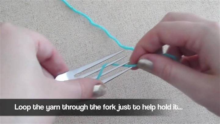 Loop the Yarn Through Fork