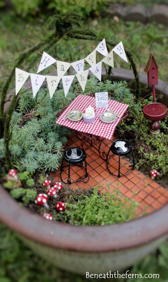 A picnic themed fairy garden