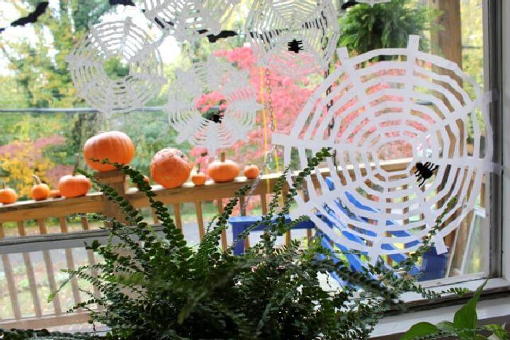 DIY Coffee Filter Spider Webs for Halloween