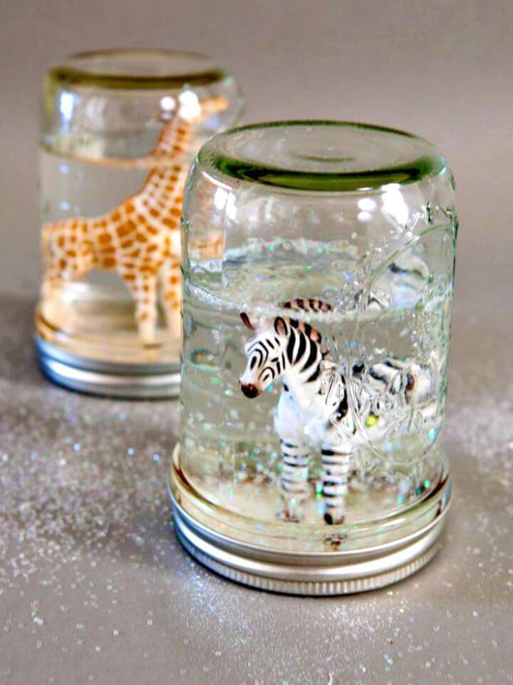How to DIY Glitter Snow Globes From Mason Jars 