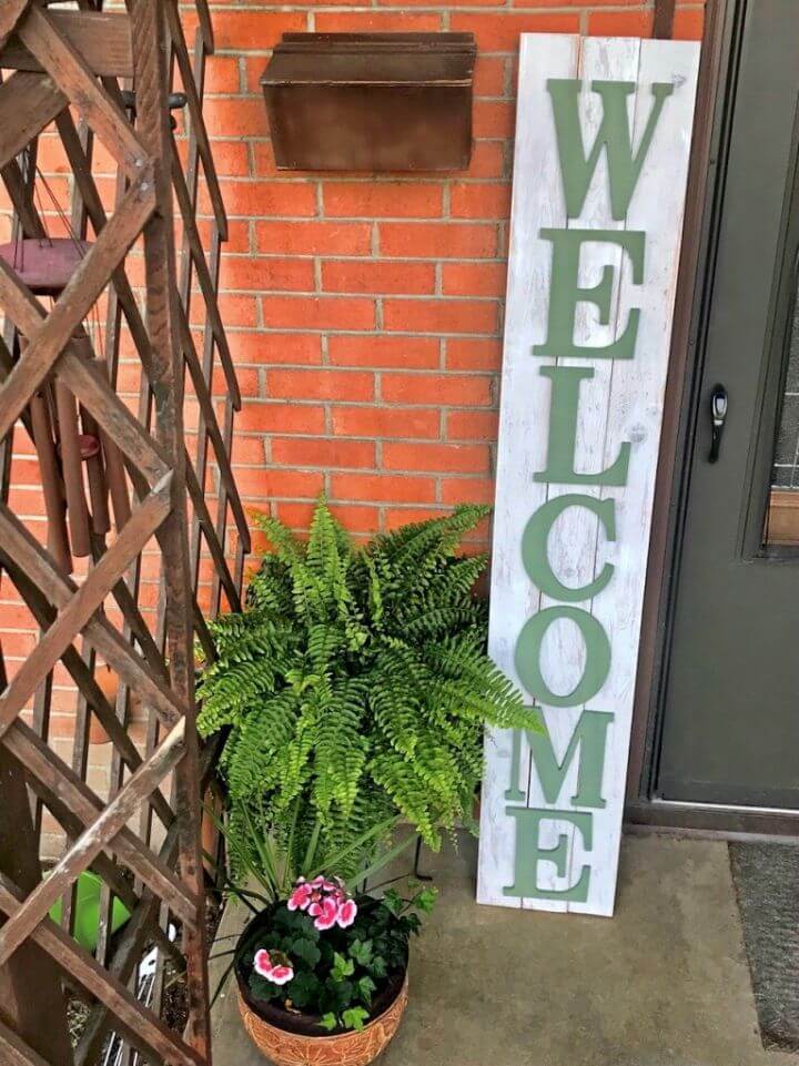 Cute DIY Front Porch Welcome Sign, say welcome to all with this porch sign this a breeze to make using wood and paint of choice!