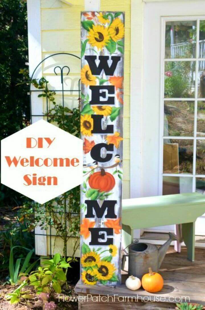 DIY Hand Painted Welcome Sign for Fall, use the paint of choice and flowers to make this colorful fall welcome sign!