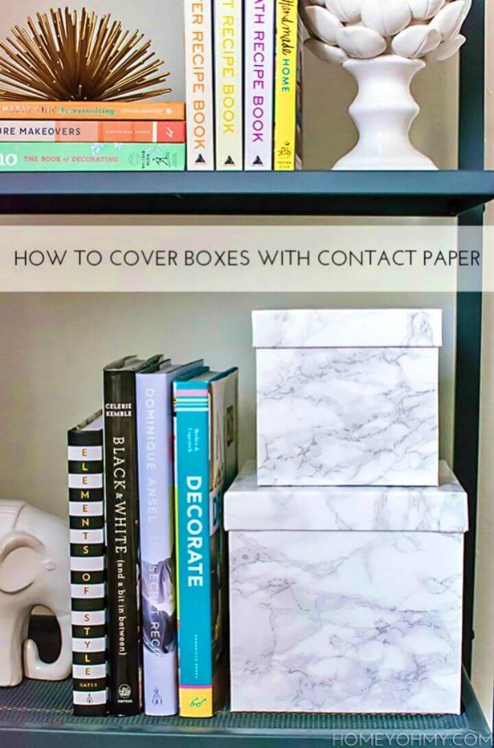 Make Cover Boxes with Contact Paper, grab also the marble contact paper and wrap it around your gift boxes and get them instantly marbleized!