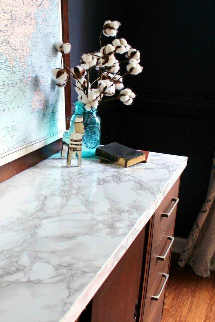 Simple DIY Faux Marble Tabletop, it is expensive to buy marble counter tops, so save a lot of your money for the marbled furniture by making faux marble furniture using marble contact paper!