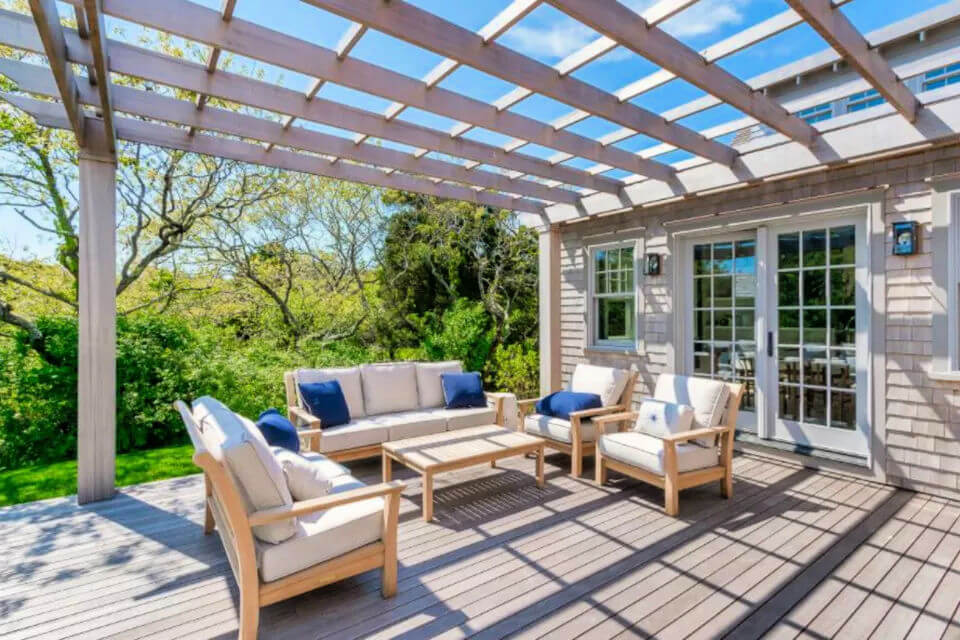 Beach style Residence With a Wood Pergola