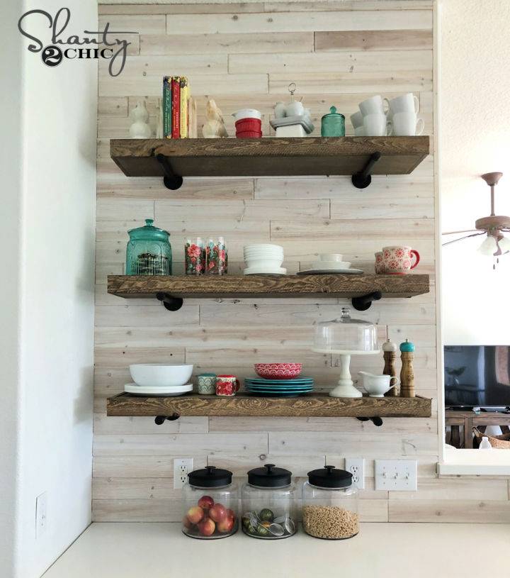 Pretty DIY Floating Shelves With Pipe