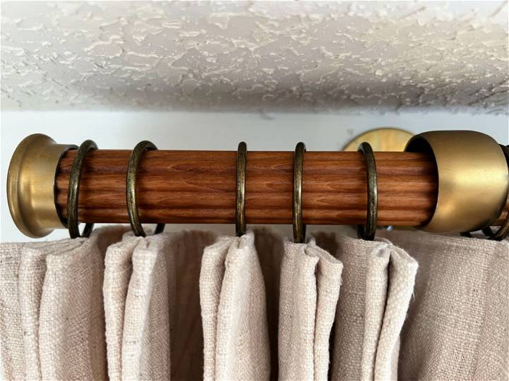 Dowel Curtain Rod With Gold Brackets and End Caps
