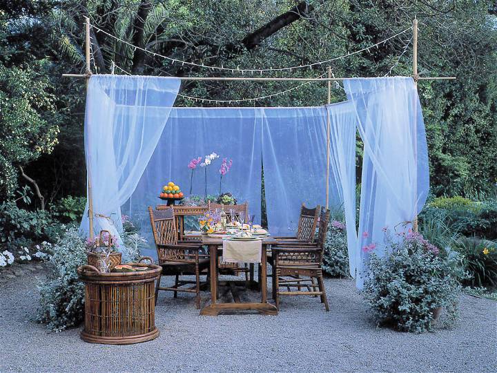 Outdoor Dining Space With Sheer Curtain