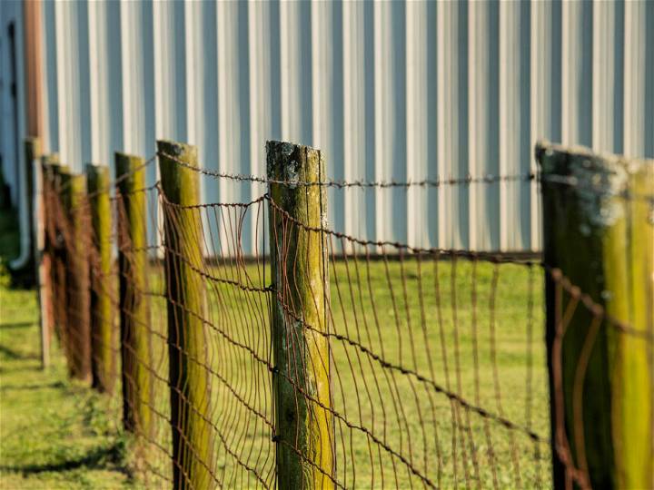 DIY Welded Wire Fence With Wooden Posts