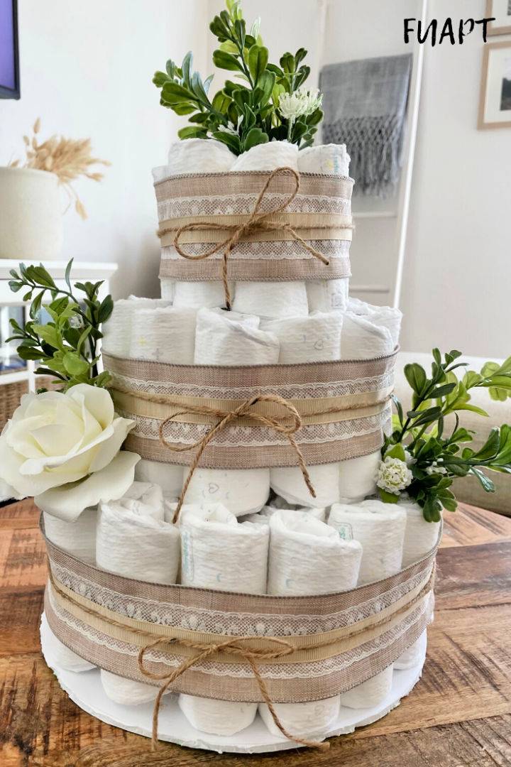DIY Diaper Cake With a Bottle of Wine Inside
