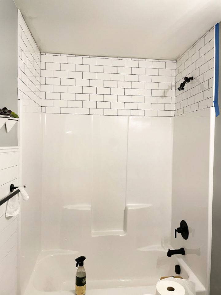 Modern Farmhouse Bathroom With Tile Wall & Dark Grout