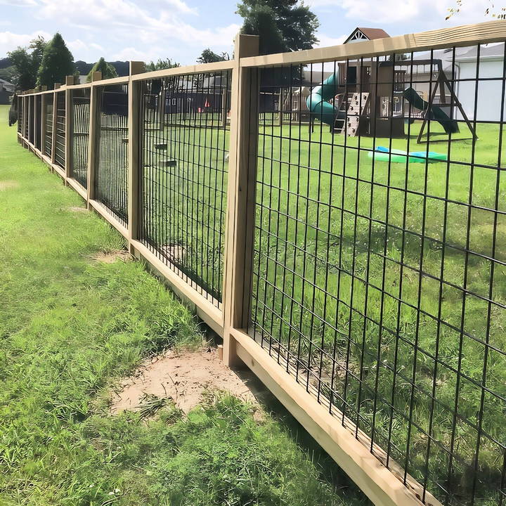 diy hog wire fence using dado groove on a sloped yard