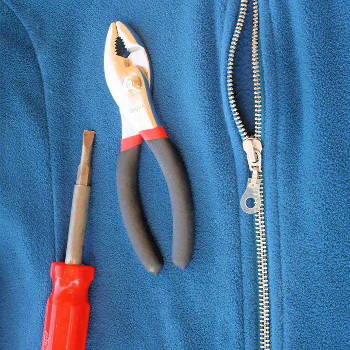 how to fix a zipper that splits from the bottom