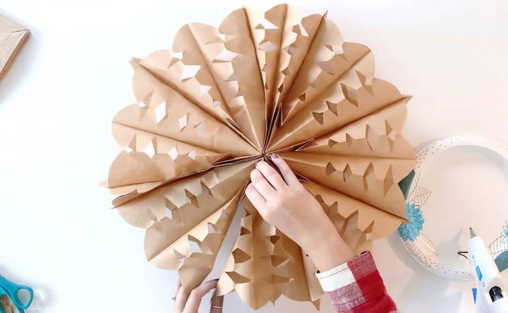 homemade paper bag snowflakes