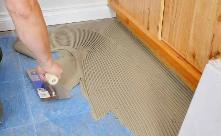 how to lay floor tiles on concrete