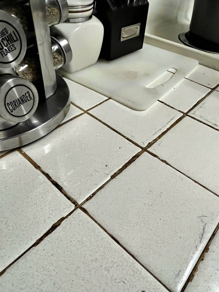 how to clean and fill grout lines in tile countertops