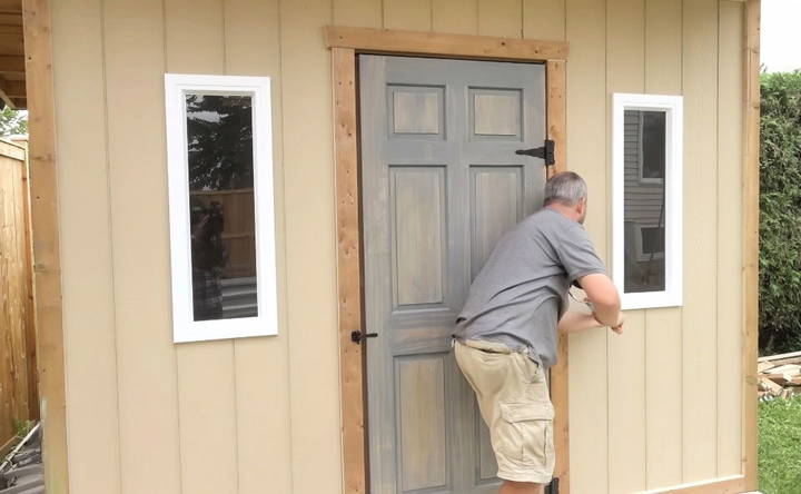 installing trim around the doors and windows