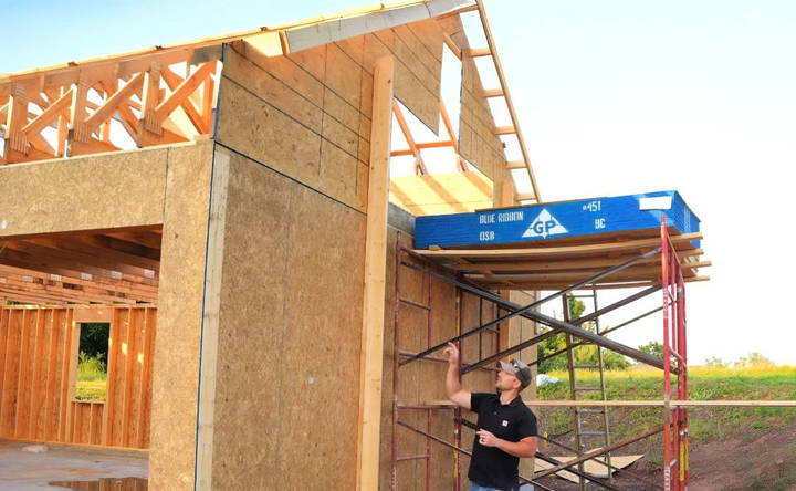 lifting and placing the roof trusses