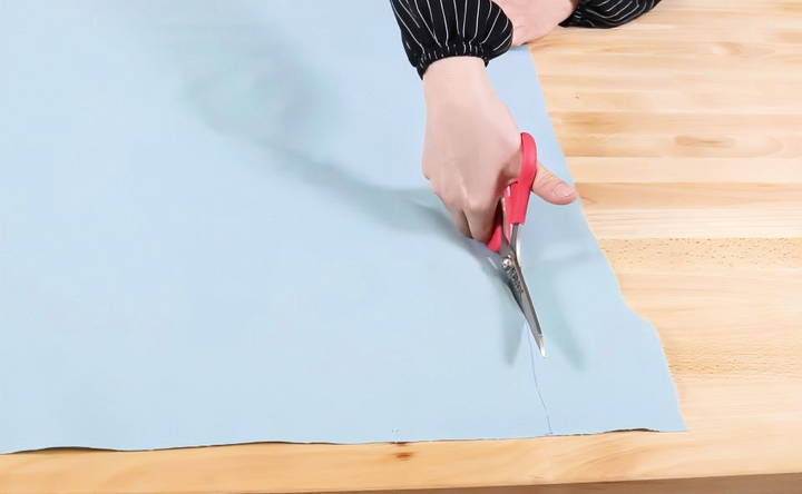 measure and cut the fabric for cushion