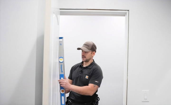 adjust the door for plumb and level