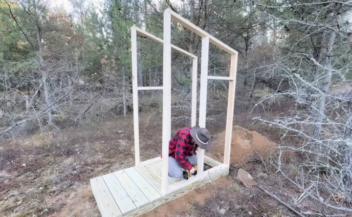 assembling the outhouse on site