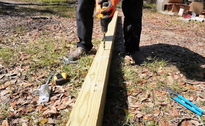 assembling the swing set top beam