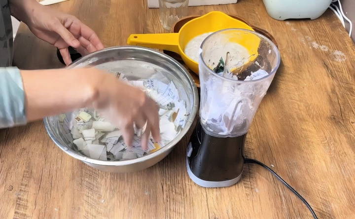 blend the paper into a pulp