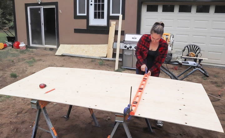 cutting the plywood backing