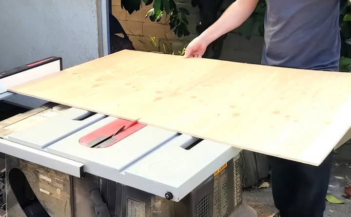 cutting the plywood for the frame