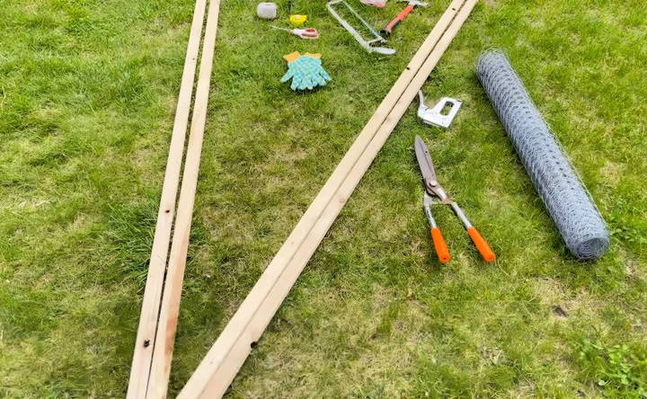 cutting the wood slats for pea trellis