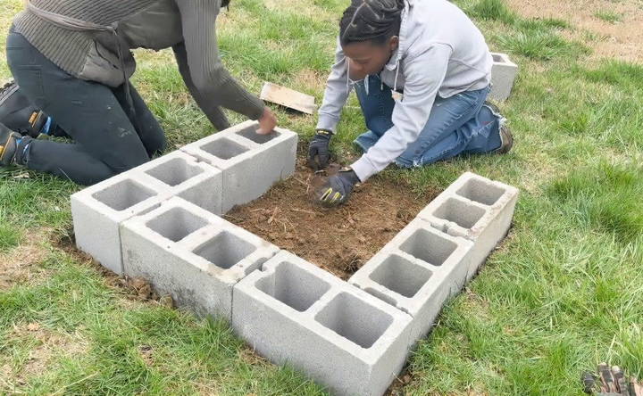 lay the first layer of cinder blocks