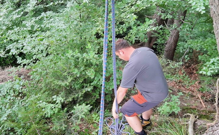 mounting the rope to a high branch or beam