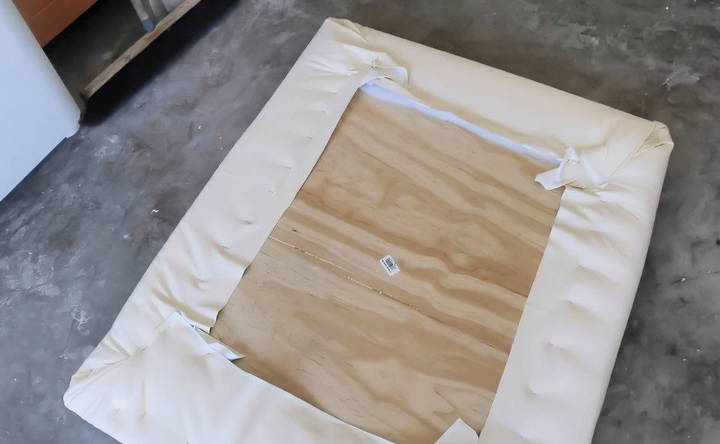 wrap the fabric around the headboard