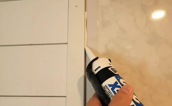 apply caulk between panel gaps