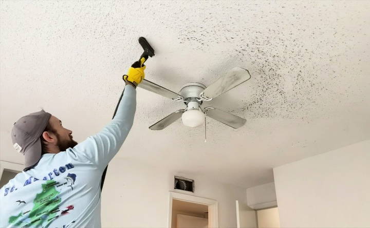 clean dust and debris from popcorn ceiling