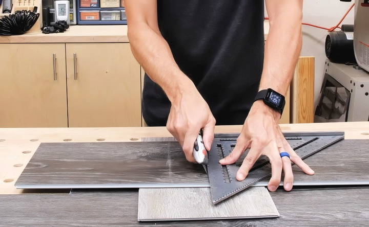 cut vinyl plank floor using a utility knife