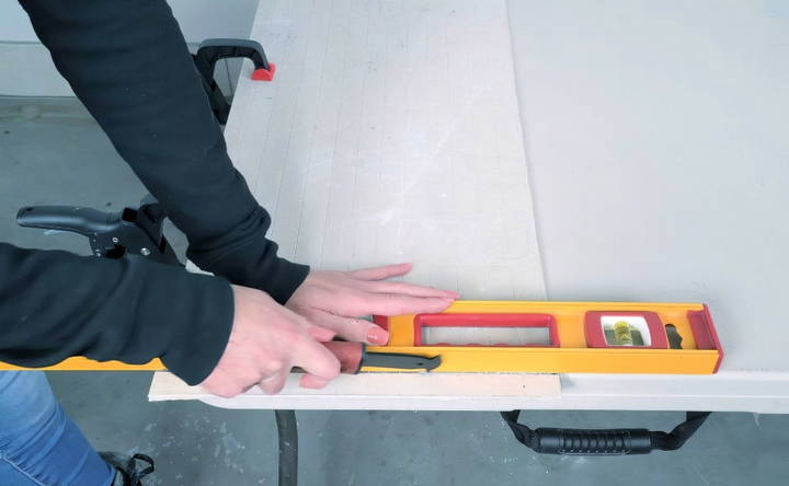 cutting cement board using a scoring knife