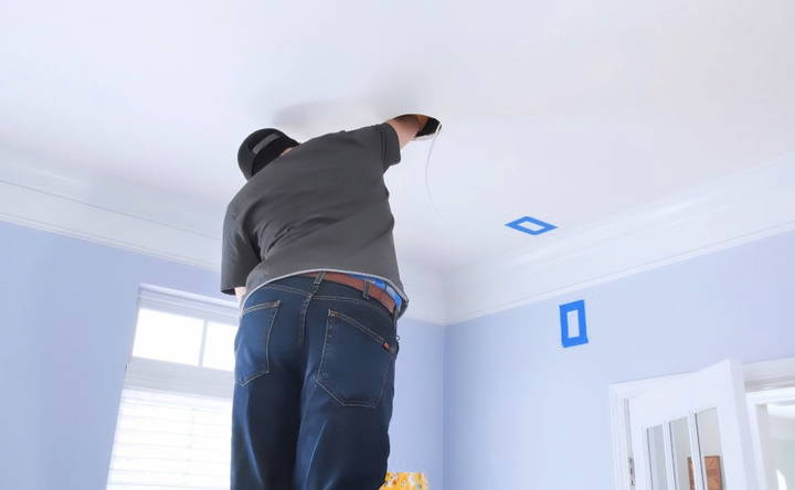 running wiring through the ceiling