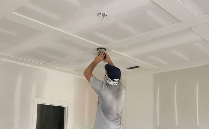 sanding the ceiling joints