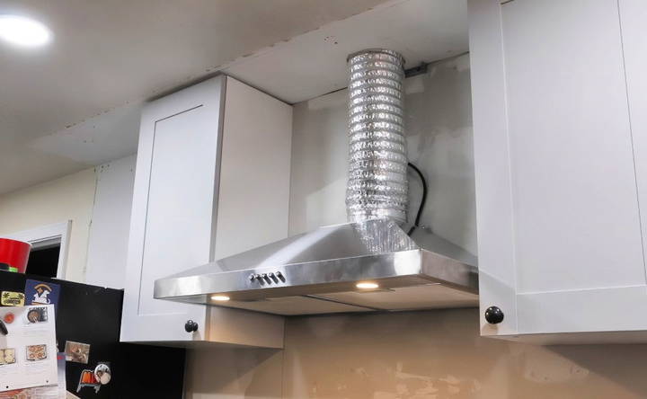 secure the range hood to the wall