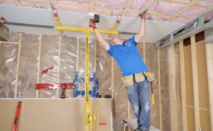 securing the drywall to the ceiling