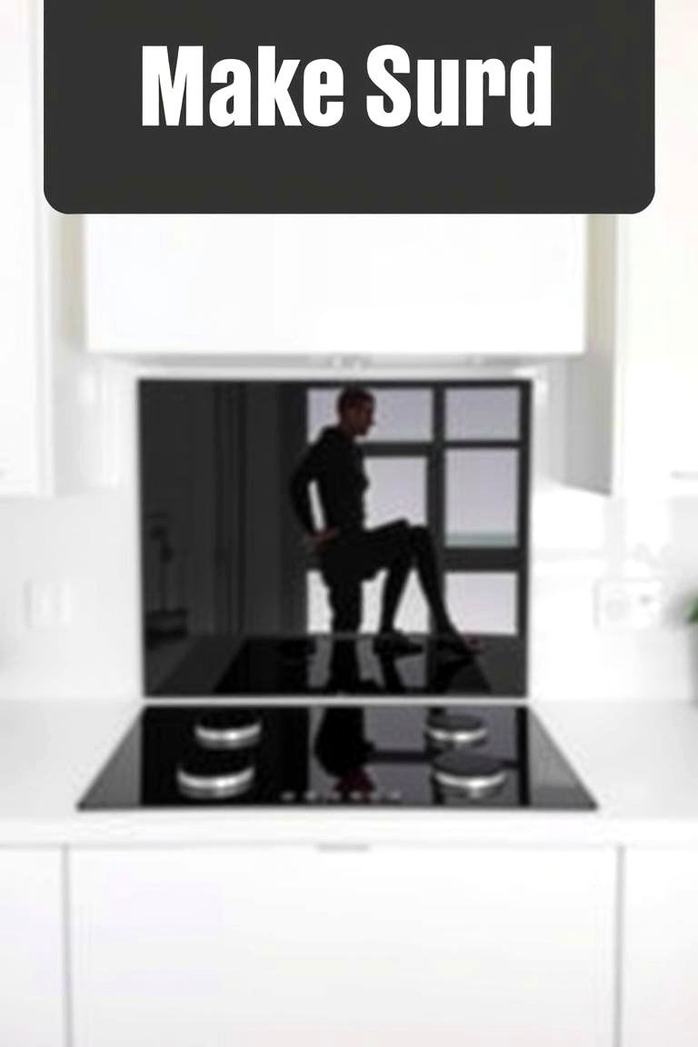 Black Backsplash Behind a White Cooktop - 24 White Kitchen with Black Appliances Ideas