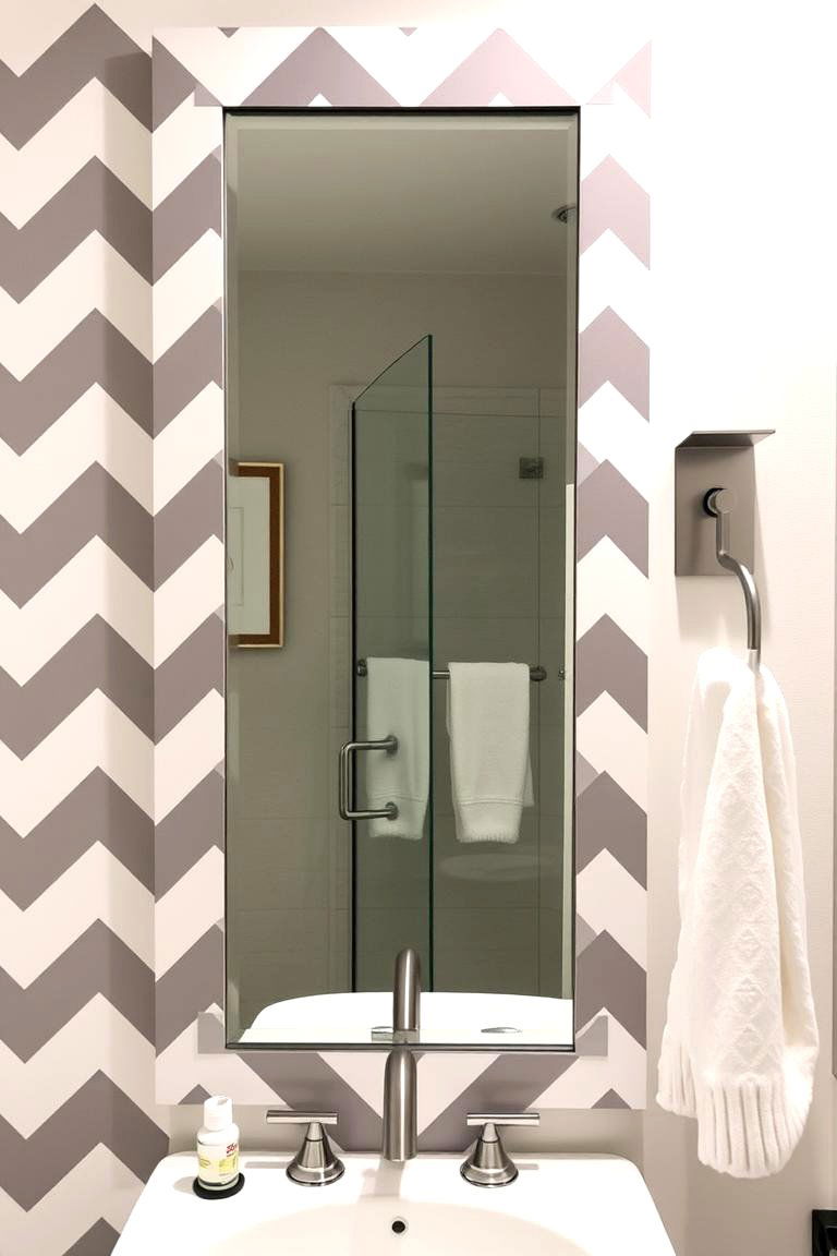 Chevron Framed Mirrors for Geometric Flair - 24 Bathroom Mirror Ideas