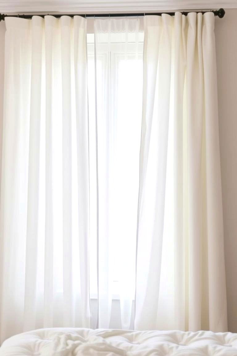 Create a Cozy Inviting Atmosphere with Curtains - 24 Small Guest Bedroom Ideas